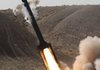 The Iran Revolutionary Guard's Tondar missile is launched in a drill Sunday near the city of Qom, 80 miles south of Tehran, in this photo released by the Iranian semi-official Fars News Agency.
