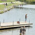 <b>Anything biting?</b>
Ashley Douthett, left, and Rachel Blevins waded into the water while Tainna...