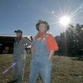 <b>Gourd-ious morning</b>
Sara Jones, left, and Kim Comer watched as school buses arrived at McGarr...