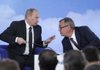 Vladimir Putin, Russia's prime minister, speaks with Andrei Kostin, chief executive officer of VTB Bank, during the Russia Calling VTB investment forum in Moscow on Tuesday.