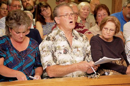 jim-aldridge-center-expresses-concerns-about-flooding-on-his-property-after-the-presentation-by-lake-conway-manager-matt-horton-also-pictured-are-shari-campbell-left-and-faye-hill