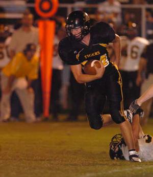 Prairie Grove senior Thomas Soehner darts up field against Cassville, Mo., in the third quarter Sept. 11, in Prairie Grove.

