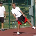 Fayetteville junior Austin Dillard practices his technique Wednesday during tennis practice at Wilso...