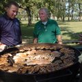 Awareness rally Washington County Sheriff Tim Helder talks Wednesday with Bill Ramsey of Fayettevill...