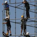 Breaking it down Workers dismantle a scaffold Wednesday afternoon at Dickey-Stephens Park in North L...