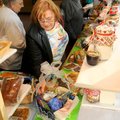 <b>Mixed feelings</b> Deloris Jennings checked out a basket of baking mixes at the 32nd annual Holid...