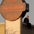 Bentonville Police Detective Mark Jordan sat atop the Krispy Kreme donut shop in Bentonville on Satu...