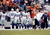 Denver Broncos wide receiver Brandon Marshall (15) runs for the game winning touchdown against the Dallas Cowboys during the fourth quarter of an NFL football game Sunday.