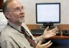 At his office at the Veterans Affairs medical center in Kansas City, Mo., Chief of Staff Dr. James Sanders shows an example of an electronic medical record.