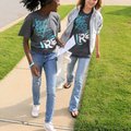 Susan Onyebuecke, 11, left, and Hailey Henderson, 12, joined other volunteers from the First Baptist...