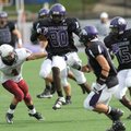 Fayetteville senior receiver Josh Hale (80) leaps to avoid Springdale senior linebacker Brandon Jeff...