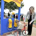 <b>Fill’er up, Mom </b>
Jen Bedwell watched as her son, Price Bedwell, 3, pretended to fill his tri...