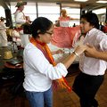 <b>Celebrating Hispanic culture</b>
Isela Mercado-Ulloa (left) and Fernando Garcia dance to music b...