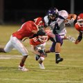Fayetteville senior receiver Michael Heintzman (4) leaps to avoid Fort Smith Northside senior Salih ...