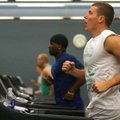 University of Arkansas sophomore Zach Dailey of Gravette and others run on treadmills Friday at the ...