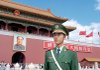 A giant portrait of Chairman Mao Zedong looks down from the central portal of Meridian Gate, the main entrance to the Forbidden City in Beijing.