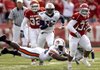 Dennis Johnson eludes a tackle for a pivotal 70-yard run at the end of the third quarter against Auburn.