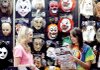 Jordan Wallace (left) and her sister Carly shop for Halloween costumes last week at the Spirit Halloween Superstore in Fayetteville.