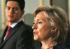 Britain's Foreign Secretary David Miliband, left, listens as U.S. Secretary of State Hillary Rodham Clinton speaks during a press conference after their talks in London, Sunday.