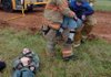 Emergency responders Blake Webb (center) from the Highfill Fire Department and Dusty Meredith from the Cave Springs Fire Department carry Luke Dunn, 11, of Springdale to lay next to David Brinkley, 12, of Gentry as they participate Saturday in a full-scale emergency exercise that simulated a plane crash at Northwest Arkansas Regional Airport.