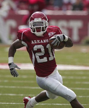 Studying footage from his past runs paid off for Arkansas running back Michael Smith, who ran for 145 yards on 18 carries against Auburn on Saturday.