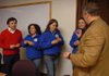 Don Marr, chief of staff for the city of Fayetteville, right, hands out keys to, from left, Robinson Esparza Muñoz, Teresa Araya Mondara, Verónica Xaviera Eltit Neuman and Carolina Aedo Sabagal on Friday at City Hall in Fayetteville. The recipients are members of the Rotary International Group Study Exchange Team from Chile. The visit coincided with Hispanic Heritage Month. Activities associated with the month will cap off this week with a visit by Luis Urrea, author of “The Devil’s Highway.”