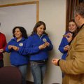Don Marr, chief of staff for the city of Fayetteville, right, hands out keys to, from left, Robinson...