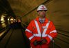 An official at the Stratford International Station in London stands near the entrance to the Channel Tunnel Rail Link in this file photo.