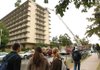 University of Arkansas students stand in front of Humphreys Hall after residents were evacuated as Fayetteville firefighters investigate smoke in the building Monday morning on campus. Students weren’t allowed back into the building for a couple of hours as firefighters traced the source of the smoke to an overheated bearing in the elevator shaft. 


