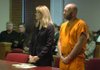 Terry Hayes stands in Circuit Judge William Storey’s courtroom with his lawyer, Kristin Pawlick, in the Washington County Courthouse on Tuesday just before being sentenced to 40 years in prison for aggravated assault on a family member.

