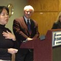 Chung Tan, left, talks to the media Wednesday at the Fayetteville Chamber of Commerce. Tan has been ...