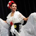 Miriam De La Torre, 13, of Springdale performed a ballet folklorico dance Thursday during the 11th a...