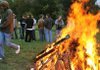 Students gathered around the bonfire during a pep rally at Bentonville High School as part of the Teen Cancer Challenge held on campus Thursday evening. 