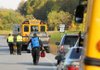 Emergency personnel prepared a patient for ambulance transport after a Bentonville School District bus was involved in an accident with another vehicle just north of the intersection of Benton County Road 40 on U.S. Highway 71 on Friday morning.