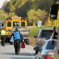 Emergency personnel prepared a patient for ambulance transport after a Bentonville School District b...