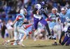Fayetteville senior receiver Josh Hale (80) leaps to avoid Fort Smith Southside senior defensive back Aaron Grant during the second quarter of play Friday in Fort Smith. 

