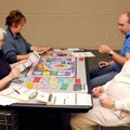Kathleen Everitt, clockwise from left, Joan Norton, Ben Wilson and Mike Norton wheeled and dealed in...