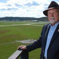 Ray Boudreaux, director of the Fayetteville Executive Airport, stands on the catwalk outside the air...
