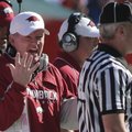 Arkansas coach Bobby Petrino argues a call with an SEC referee during the Razorbacks' 23-20 loss to ...