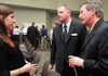 Superintendent Gary Compton, right, and Steve Potts, executive director of human resources for the Bentonville School District, talked with Libby Wolfe, 17, of Bentonville before a Bentonville School Board meeting held at the Bentonville Public Library in October 2009.