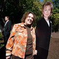 Master gardener Joyce Mendenhall of Fayetteville carries a standup photo of Hillary Rodham Clinton f...