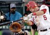 Los Angeles catcher Jeff Mathis hits his second double of the game, this one to left-center in the 11th inning, scoring Howie Kendrick from first and giving the Angels a 5-4 victory over the New York Yankees in the American League Championship Series on Monday in Anaheim, Calif.