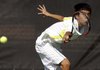 Little Rock Central’s Mario Martinez overcame severe leg cramps to defeat Fayetteville’s Rob Hodous 6-4, 1-6, 7-6 (5) and win the Class 7A state tennis championship on Tuesday in Fayetteville. 
