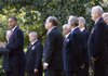 President Barack Obama speaks Tuesday in the Rose Garden during a ceremony honoring recipients of the Presidential Unit Citation. With Obama are members the honored unit.