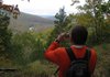 David Justice of Lincoln photographs of one of many scenic views during an Ozark Society hike Saturday at Devil's Den State Park. Visible in the distance is Devil Lake in the heart of the park. 