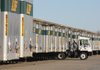 A driver hooks up to a trailer to move it around an Arkansas Best Corp. lot in North Little Rock in this 2008 file photo. 