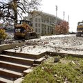 Workers with Nabholz Construction clear the location of the former Alpha Gamma Rho fraternity house ...