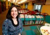 Shawna Thorup, the executive director of the Fayetteville Public Library, stands in her favorite space, the Children's Library.