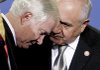 Turkish Defense Minister Mehmet Vecdi Gonul (right) speaks Friday with U.S. Secretary of Defense Robert Gates after a group photo of NATO defense ministers in Bratislava, Slovakia.