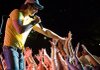 Joe Nichols keeps the crowd happy at a recent concert. The Rogers native returns to Arkansas for a performance Thursday. His new album, Old Things New, will be released Tuesday.